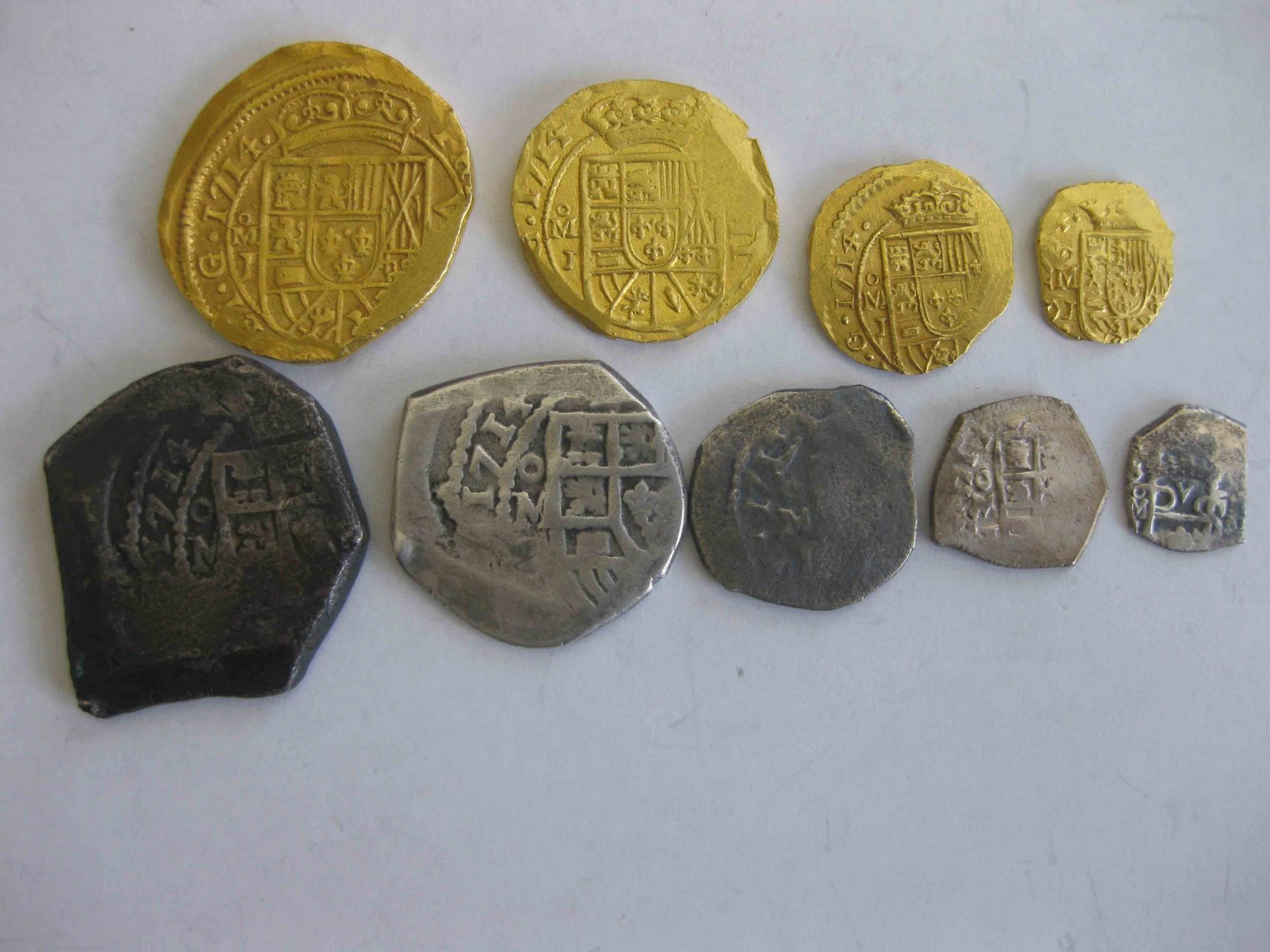 Mexico 1714 silver cobs and a complete set of Mexico 8 Escudos from 1714