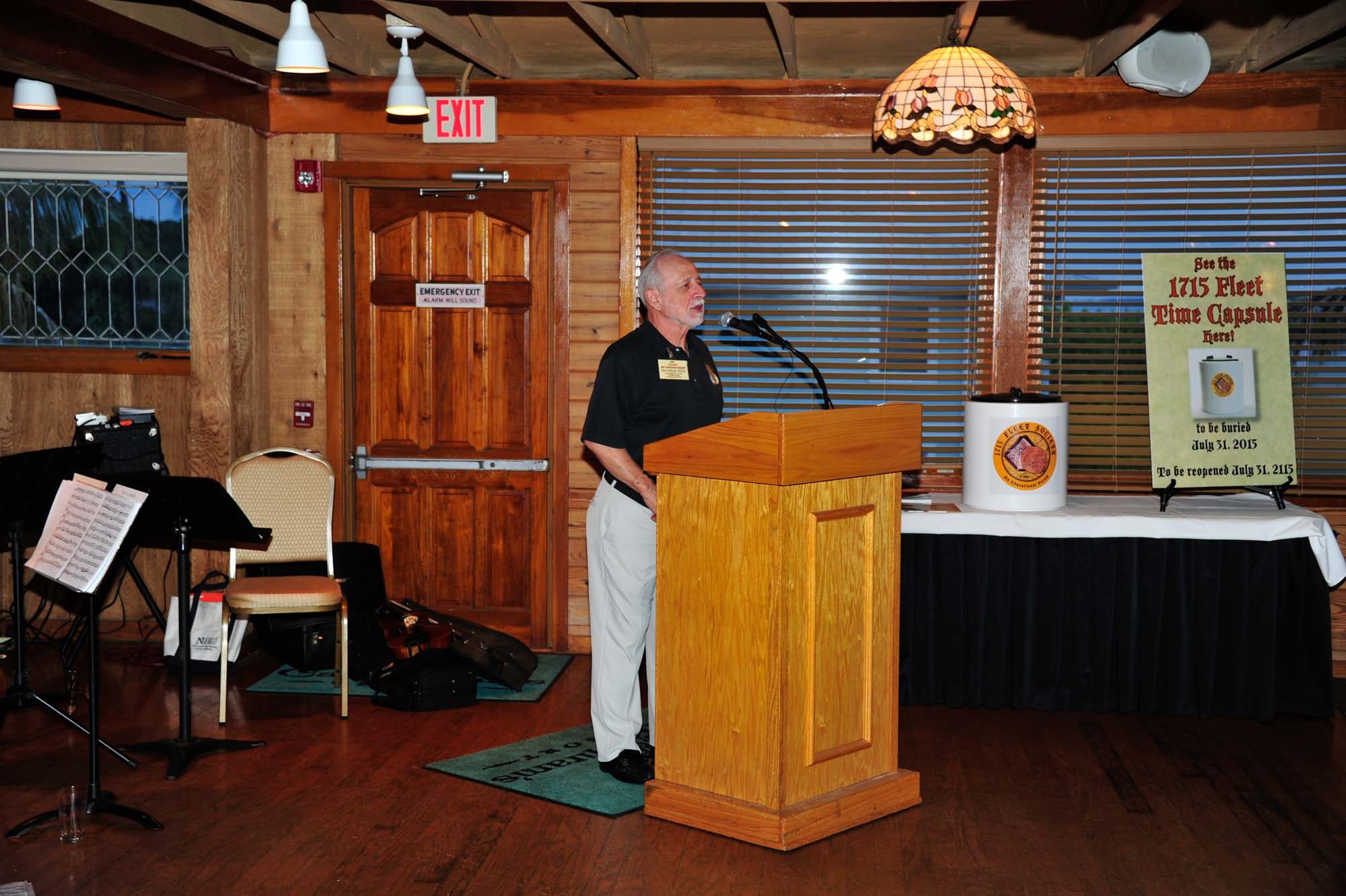 Fleet Society Director Ernie Richards addresses banquet guests