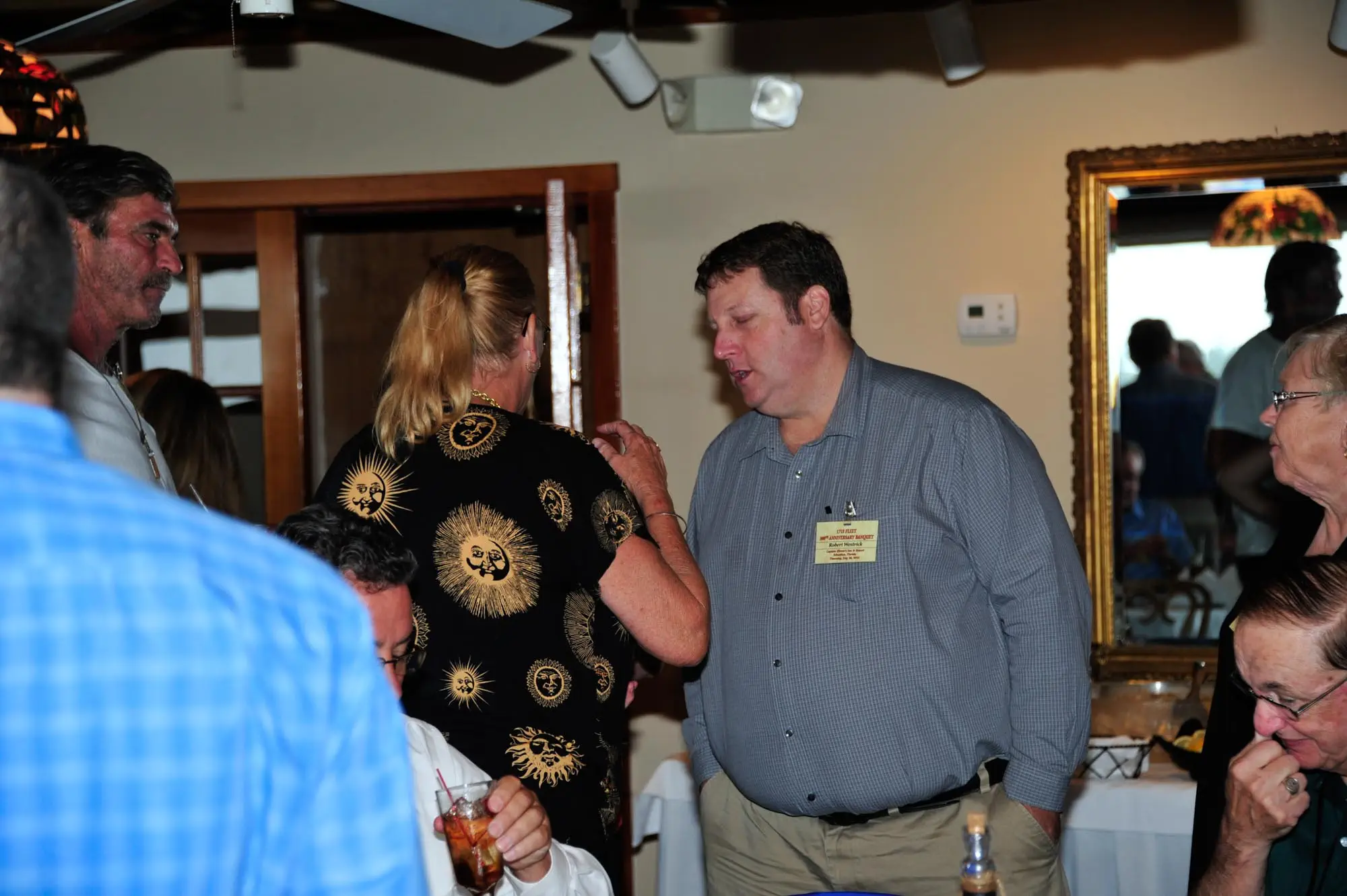 Author and marine archaeologist Rob Westrick shares a comment with Taffi Abt of the Mel Fisher Museum in Sebastian, Florida