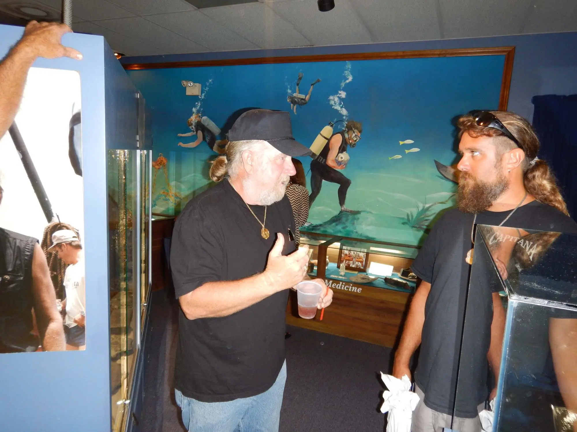 Captain John Brandon conversing with Meet and Greet guest