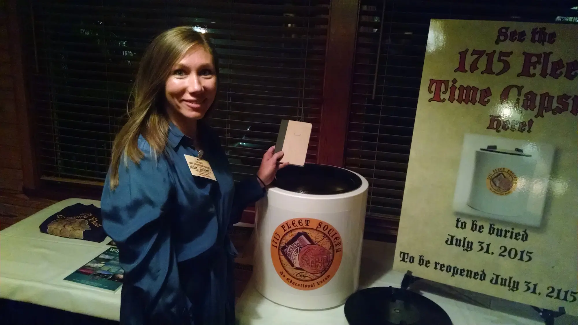 Nicole Capp-Holbrook places journal in the time capsule